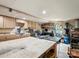 Large basement with a workshop and lots of cabinets for storage at 613 W Pine St, Kershaw, SC 29067