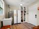 Mud room with storage space, utility sink, and access to the exterior at 613 W Pine St, Kershaw, SC 29067
