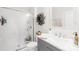 Well-lit bathroom featuring a glass-enclosed shower, vanity, and stylish fixtures for a spa-like feel at 619 Vega Nw St, Concord, NC 28027