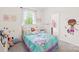 Charming bedroom with unicorn themed bed, decorated walls, and plenty of natural light from the window at 619 Vega Nw St, Concord, NC 28027