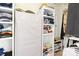 Organized walk-in closet with shelving, storage, and ample space for clothing and accessories at 619 Vega Nw St, Concord, NC 28027