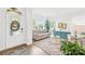 Bright and inviting living room with large windows, neutral decor, and hardwood floors at 619 Vega Nw St, Concord, NC 28027