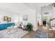 Bright and open-concept living room with modern furnishings and hardwood flooring at 619 Vega Nw St, Concord, NC 28027