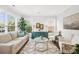 Cozy living room featuring bright natural light, a modern rug, and comfortable seating at 619 Vega Nw St, Concord, NC 28027