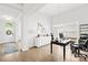 Inviting office space with hardwood floors, stylish decor, and ample natural light from large window at 619 Vega Nw St, Concord, NC 28027