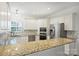 Well-appointed kitchen with stainless steel appliances, granite counters and ample cabinet space at 6723 Joliette Ln, Charlotte, NC 28277