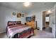 Cozy bedroom features a queen-sized bed, dresser, and television at 735 Shuttles Way, Fort Mill, SC 29715
