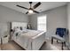 Cozy bedroom with ceiling fan, one window, and a comfortable queen-sized bed at 735 Shuttles Way, Fort Mill, SC 29715