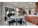 Bright dining area next to an open kitchen with view into the living room at 735 Shuttles Way, Fort Mill, SC 29715