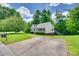 Charming single-story home with a well-manicured lawn, inviting front porch, and ample parking at 735 Shuttles Way, Fort Mill, SC 29715