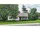 Charming single-story home featuring a cozy front porch and well-maintained landscaping at 735 Shuttles Way, Fort Mill, SC 29715