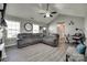 Spacious living room featuring tile floors, a vaulted ceiling and abundant natural light at 735 Shuttles Way, Fort Mill, SC 29715