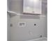 Laundry room with upper cabinets and hookups for a washer and dryer, promising convenience at 7942 Vista View Dr, Sherrills Ford, NC 28673