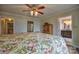 Main bedroom providing a tranquil escape with a glimpse into the luxurious en suite bath at 7942 Vista View Dr, Sherrills Ford, NC 28673