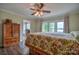 Relaxing main bedroom with balcony and en suite bathroom, creates a luxurious and private space at 7942 Vista View Dr, Sherrills Ford, NC 28673