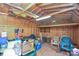 A well-lit storage shed with a variety of household items, useful for storing items at 7942 Vista View Dr, Sherrills Ford, NC 28673