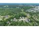 High aerial view of 968 Autumn Glen Ct nestled in a lush neighborhood with mature trees and tranquil surroundings at 968 Autumn Glen Ct, Clover, SC 29710