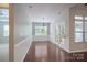 Bright dining room with hardwood floors, wainscotting, and access to the outdoor patio at 968 Autumn Glen Ct, Clover, SC 29710