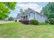 Well-maintained home with manicured lawn and landscaping, including a two-car garage at 968 Autumn Glen Ct, Clover, SC 29710