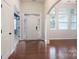 Bright foyer featuring hardwood floors, elegant windows, and a welcoming entrance at 968 Autumn Glen Ct, Clover, SC 29710