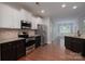 Well-equipped kitchen with stainless steel appliances and stone countertops for easy cooking and serving at 968 Autumn Glen Ct, Clover, SC 29710