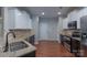 Modern kitchen featuring stainless steel appliances, granite counters, and ample cabinet space at 968 Autumn Glen Ct, Clover, SC 29710