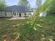 Backyard features a patio and storage shed, offering outdoor living space at 978 Stinson Glen Ln, Charlotte, NC 28214