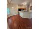 Bright breakfast nook with hardwood floors is adjacent to the kitchen at 978 Stinson Glen Ln, Charlotte, NC 28214