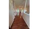 Spacious living room featuring hardwood floors and a cozy fireplace at 978 Stinson Glen Ln, Charlotte, NC 28214