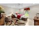 Bright bedroom with neutral paint, soft natural light, and sitting area at 102 Sussex Ave, Cherryville, NC 28021