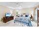 Sunlit main bedroom featuring a ceiling fan, and decorative side tables and lamps at 102 Sussex Ave, Cherryville, NC 28021