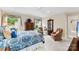 Well-lit main bedroom with sitting area, and an abundance of natural light at 102 Sussex Ave, Cherryville, NC 28021