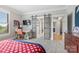Spacious bedroom with barn doors and a dedicated desk area perfect for work or study at 1045 Spyglass Ln, Waxhaw, NC 28173