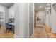 Hallway area featuring built in desk and wood flooring at 1045 Spyglass Ln, Waxhaw, NC 28173