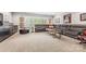 Comfortable living room featuring a large sectional sofa, entertainment center, and ample seating at 1045 Spyglass Ln, Waxhaw, NC 28173
