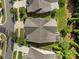 Aerial view of the home highlights the roof, landscaping, and patio area at 11621 Mount Argus Dr, Cornelius, NC 28031