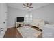Comfortable Bedroom with modern wood floors and light gray paint providing a serene atmosphere at 11621 Mount Argus Dr, Cornelius, NC 28031