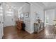 Elegant foyer features hardwood floors, tasteful decor, and ample natural light, creating a warm welcome at 11621 Mount Argus Dr, Cornelius, NC 28031
