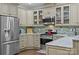 Well-appointed kitchen with stainless steel appliances, granite countertops, and plenty of storage, perfect for cooking at 11621 Mount Argus Dr, Cornelius, NC 28031