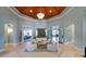 Clubhouse lobby featuring high ceilings, contemporary chandelier and cozy seating area at 11621 Mount Argus Dr, Cornelius, NC 28031