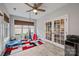 Bright and airy sun room filled with play equipment and featuring large windows at 11621 Mount Argus Dr, Cornelius, NC 28031