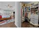 Neatly organized walk-in closet with multiple shelves, hanging racks, and built-in drawers at 11621 Mount Argus Dr, Cornelius, NC 28031