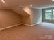 Bonus room with carpet flooring, neutral paint, recessed lighting, and large windows at 12033 Lavinia Ln, Charlotte, NC 28277