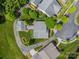 Aerial view showcasing the home's roof and the mature landscaping of the property at 13360 Old Compton Ct, Pineville, NC 28134