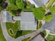 Birds-eye view showing the home's roof, surrounding landscaping and well manicured lawns at 13360 Old Compton Ct, Pineville, NC 28134