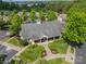 Aerial view of a community building with manicured lawns and sidewalks at 13360 Old Compton Ct, Pineville, NC 28134