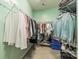 Spacious walk-in closet with ample shelving and plenty of room for clothes at 13360 Old Compton Ct, Pineville, NC 28134