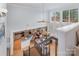 Open-concept living space with kitchen, dining and living room offers a versatile and inviting space at 13406 Ada Ct, Charlotte, NC 28213
