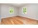 Bright bedroom featuring hardwood floors, natural light and neutral paint at 14834 Pawnee Trl, Matthews, NC 28104