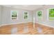 Bedroom featuring hardwood floors, natural light and neutral paint at 14834 Pawnee Trl, Matthews, NC 28104